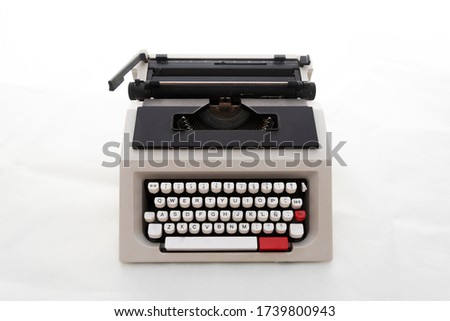 olivetti typewriter with white background