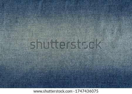 Seamless blue denim cotton jeans fabric texture background and wallpaper 