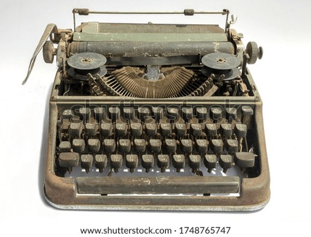 Ancient typewriter on with blackground