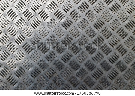 Metallic geometric pattern. Abstract background steel. Flooring pad
