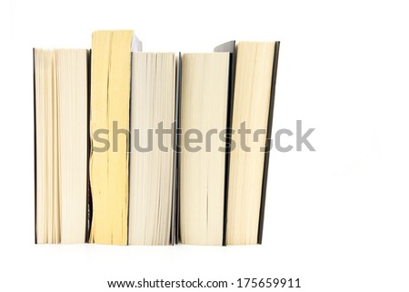 Several paper books isolated on white background