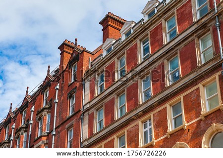 Close-up view of brick residential tenement house. Birmingham downtown classic architecture, West Midlands, UK.