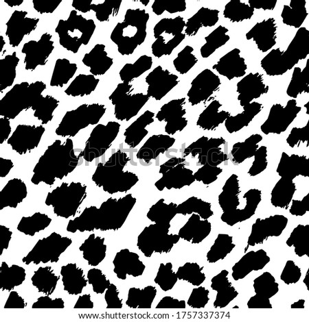 Animal seamless patterns. Leopard are made in black ink, isolated on white background. The object of nature is a naturalistic sketch.