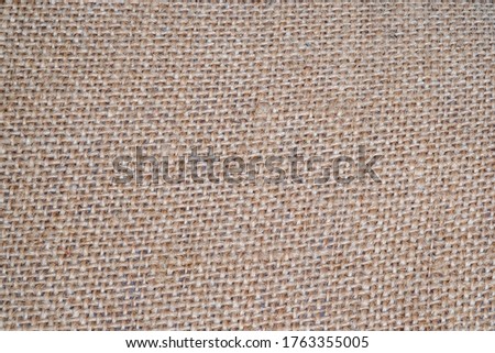 Raw linen sackcloth background or texture