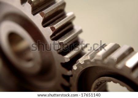 Two gears meshing together