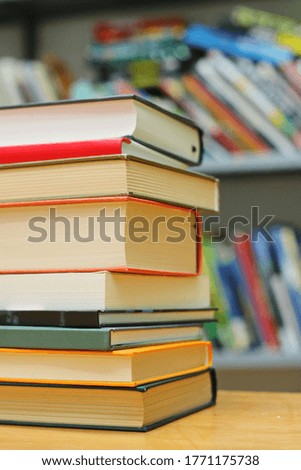 Stack of books in library
