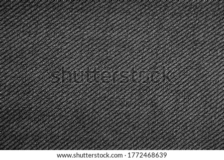 The background of black fabric pattern textured