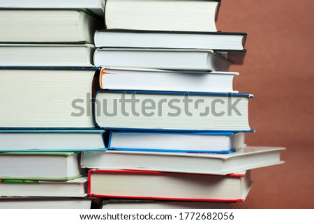 Stacks of books of different sizes. High quality photo.