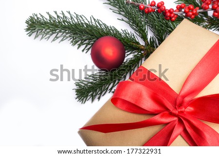 present and christmas decoration on white background