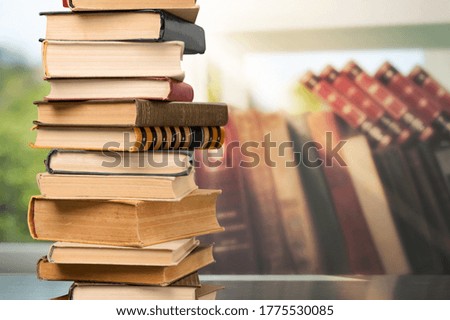 Collection stack of old retro books on background