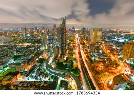 Top view of Bangkok city at night(Taksin Bridge)In the Thonburi area