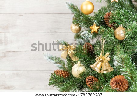 Christmas greeting card with decorated fir tree and copy space for your xmas greetings