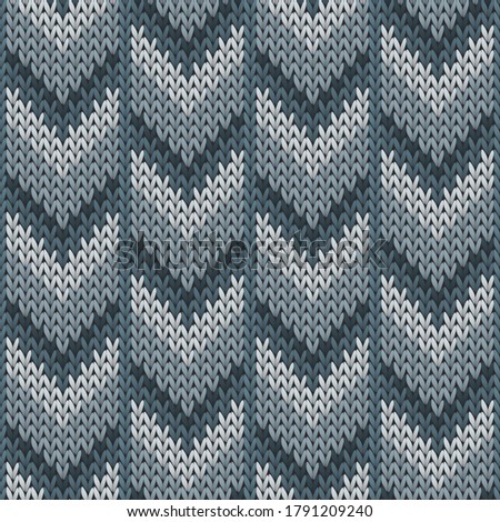 Material downward arrow lines knitted texture geometric seamless pattern. Pullover knitwear structure imitation. Winter seamless knitted pattern. Winter holidays wallpaper.