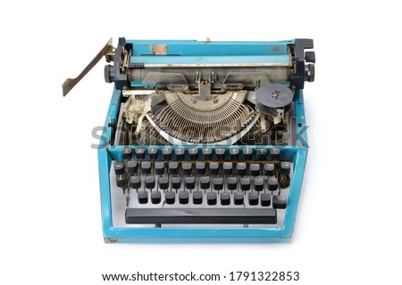 Old typewriter isolated on white background