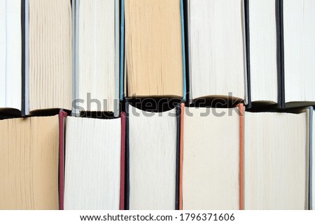 Close-up of several books facing each other. Learning concept.