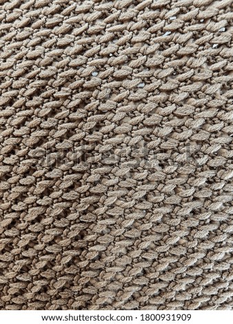 Brown background image with stripes.