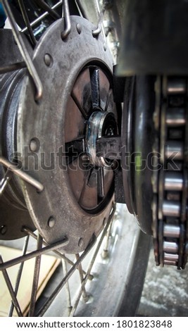 vintage motorcycle rear wheel disassemble closeup