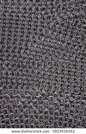 chain mail close up texture background. abstract iron ring backdrop. protection concept.