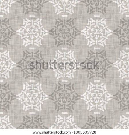 Natural gray french woven linen damask texture background. Old ecru flax wave motif seamless pattern. Organic farmhouse country weave fabric for wallpaper. 