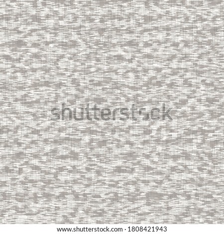 Seamless speckled gray french woven linen texture background. Mottled ecru natural flax fiber pattern. Organic farmhouse cottage fabric flecks for textile all over print. 