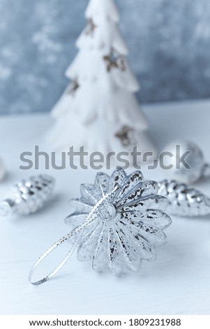 Christmas decoration. Bright wooden background.