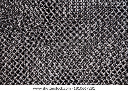 chain mail close up texture background. abstract iron ring backdrop. protection concept.