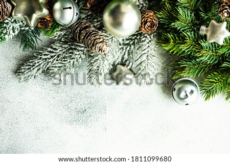 Christmas card concept with xmas tree and decor on concrete background with copy space