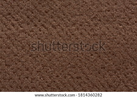 Simple brown textile background. High resolution photo.