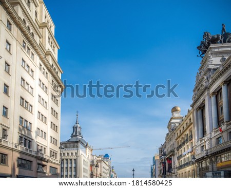 Blue sky over Gran Via boulevard in downtown Madrid, Spain