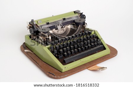  
old typewriter on a light background                              