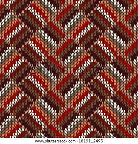 Knitted seamless pattern. Classic knitwear red white brown ornament. Fashion trendy stylish background