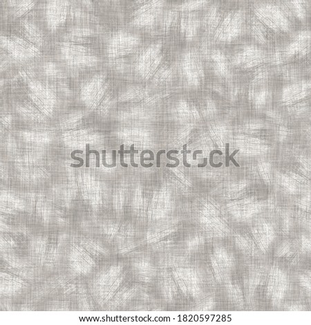 Seamless mottled gray french woven linen texture background. Old ecru natural flax fiber pattern. Organic farmhouse cottage fabric for textile all over print. 
