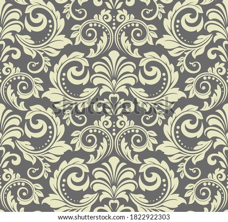 Wallpaper in the style of Baroque. Seamless background. Grey floral ornament. Graphic pattern for fabric, wallpaper, packaging. Ornate Damask flower ornament