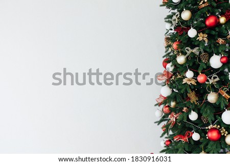 Christmas tree twigs with decor for the new year place for inscriptions