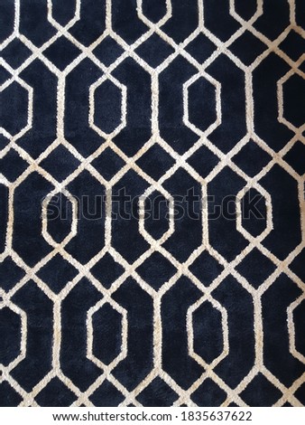 Gold pattern on black vintage fabric for designers