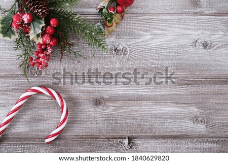 Christmas or new year wooden background with red decorations with copy space.