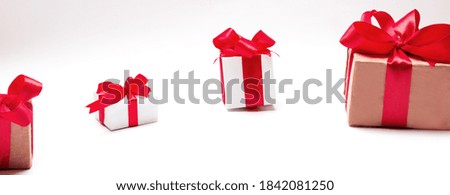 Valentine day composition: many gift boxes with red bows on white background. with copy space. Love concept.