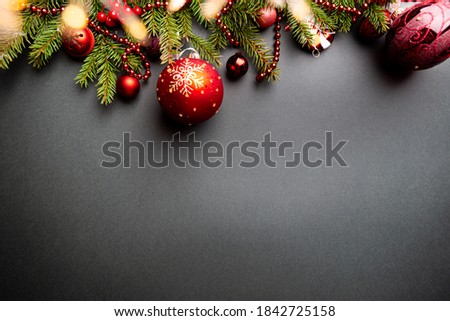 Christmas holidays composition on black background with copy space for your text