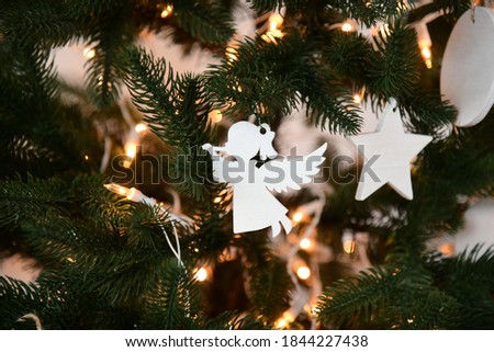 Christmas tree with white decorations