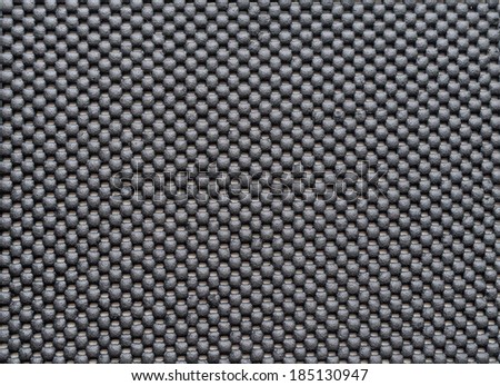 Close up image of black dash mat for cell phone