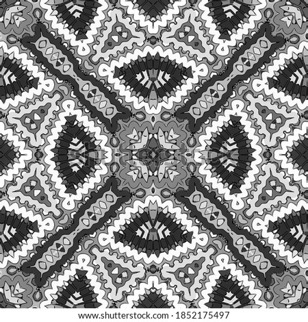  Seamless pattern with floral and mandala elements. Black and white decorative doodle background.