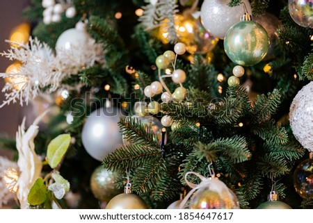 Christmas green pine tree with background bokeh light, toning color.