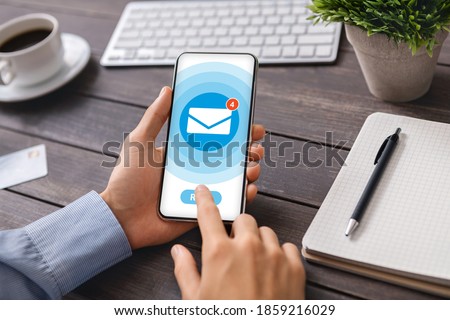 Collage with businessman opening unread messages in mobile email application at office desk, close up of hands. Young man receiving business correspondence, newsletter or spam
