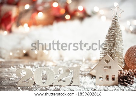 Festive abstract christmas background with wooden number 2021 close up and decor details.