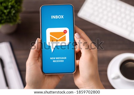 Digital mail and online marketing concept. Cropped view of young woman opening incoming email on smartphone with mobile post app on screen, collage. New message received notification
