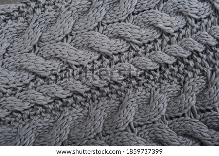 Fabric gray background.
texture knitted woolen sweater. Abstract knitted fabric background

