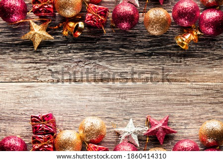 Christmas ornaments and decorations on wooden table with space for copy space