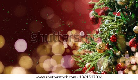 Decorated with ornaments and lights Christmas tree on red background. Merry Christmas and Happy Holidays greeting card, frame, banner. New Year.