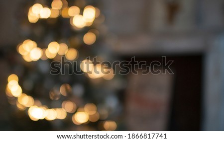 Christmas golden bokeh lights. Celebration concept. New year card with magical christmas tree lights is on the beautiful background. Magic night texture. Time of miracles