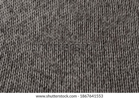 knitted gray background with front side